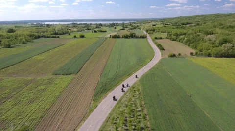 Bikers riding on the rural road Stock Footage 48242582