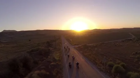 Bikers into Sunset Stock Footage