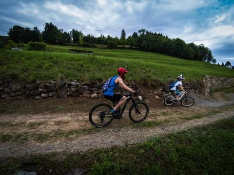 Bikers on a trail on a cloudy day, Action Sports, Downhill Stock Photos