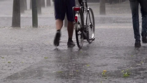 Bikes and cycling in the rain Stock Footage 76163477