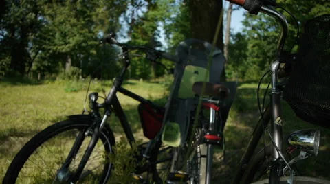 The bikes are under the tree Stock Footage 64014625
