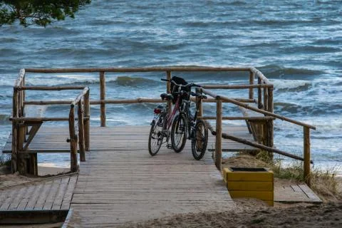 Bikes on boardwalk Stock Photos
