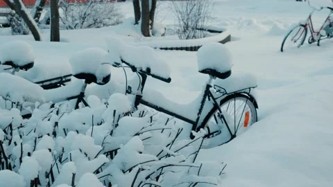 Bikes Coverd In Snow Stock Footage 169793155