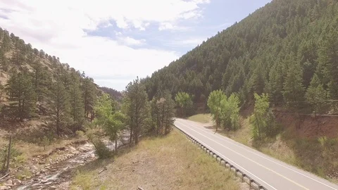 Bikes Crossing On A Mountain Road Stock Footage 100208882