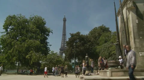 Bikes pass Eiffel Tower, Paris Stock Footage 4928151