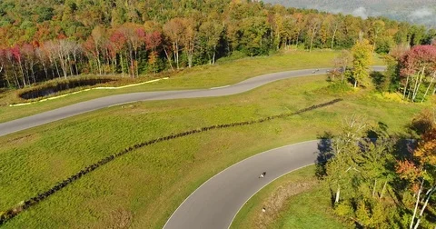Bikes racing on track Stock Footage 83694104