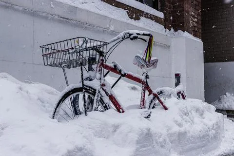 Bikes stuck in the snow Stock Photos