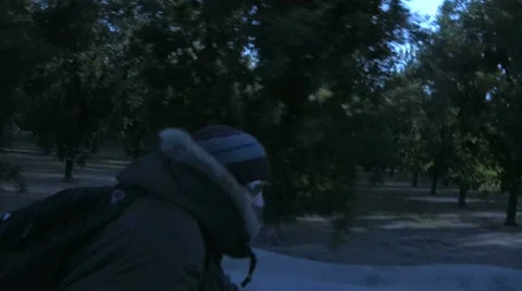 Biking Cold Tree Orchard II Stock Footage 8692435
