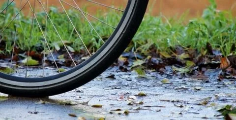 Biking in the rain Stock Photos