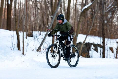 Biking in the snow Stock Photos