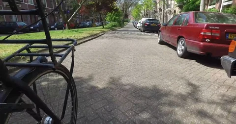 Biking through Amsterdam 01 스톡 동영상 111954280