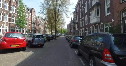 Biking through Amsterdam 스톡 동영상 114175966