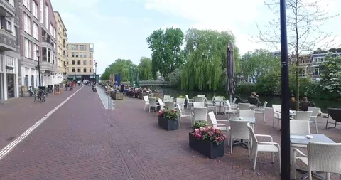 Biking through Amsterdam 스톡 동영상 114176864