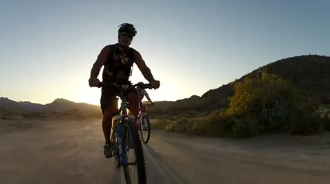 Biking Through The Sunset 스톡 동영상 22101965