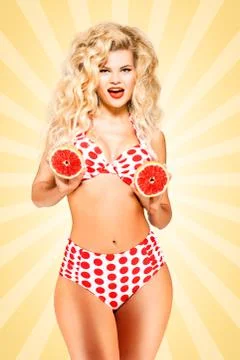 Bikini and grapefruit. Stock Photos