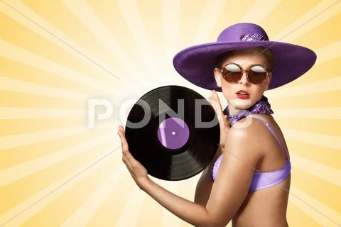 Bikini and vinyl. Stock Photos
