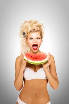 Bikini and watermelon. Stock Photos
