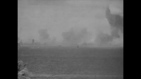 BIKINI ATOLL - 1946: Smoke-bound sea - Dense haze hides the target fleet Stock Footage 344498685