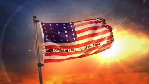 Bikini Atoll Flag Backlit At Beautiful Sunrise Loop Slow Motion 4K Stock Footage 76256694