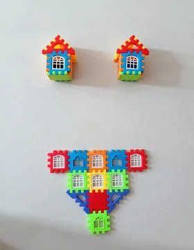 Bikini concept represented by the building blocks of house. Friendly way to pres Stock Photos