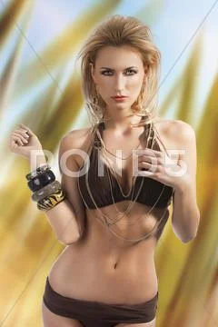 Bikini fashion summer girl, looks in to the lens Stock Photos