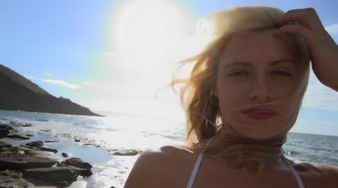 Bikini model moves in slow motion on Maui beach Video stock 43793564