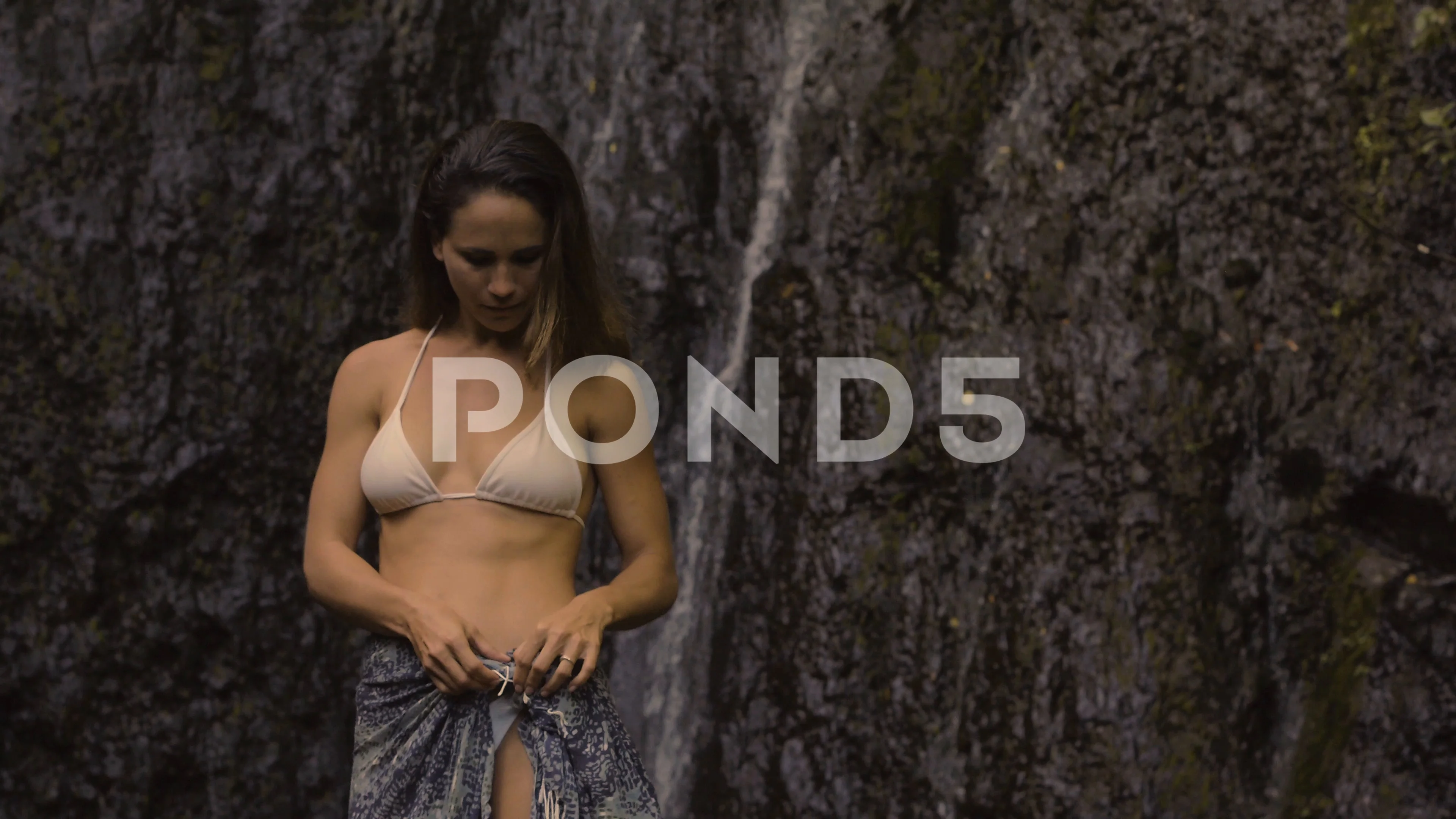 Bikini Woman at Jungle Waterfall Takes O, Stock Video