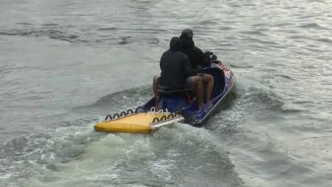 BILBAO, SPAIN; JUNE 30 2018: Spectators watching cliff diving from boats Stock Footage 329611069