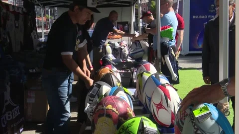 BILBAO, SPAIN; MAY 11 2018: buying rugby items at the market stalls Stock Footage 335467426