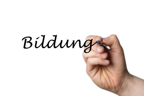 Bildung written by a hand Stock Photos