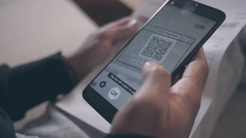 Bill payment transaction via QR code reader and mobile paying app Stock Footage 154006887