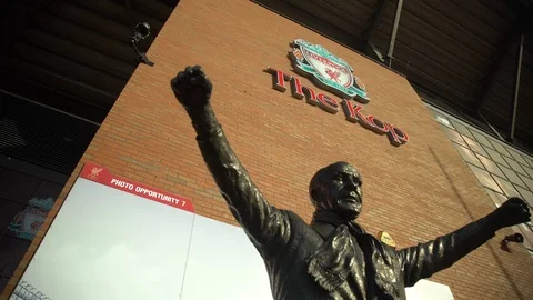 Bill Shankly statue in front of the Kop at Anfield Stadium, Liverpool Football  動画素材 124608341
