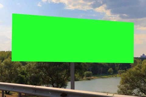 Billboard along the highway. Background for design and advertising. Stock Photos