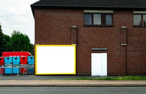 Billboard at the backside of an store in germany Stock Photos