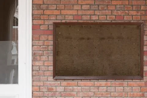 Billboard on brick wall Stock Photos