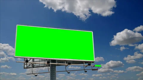 Billboard with a green screen chroma in front of cloudy sky time-lapse, seamless Stock Footage 47646127