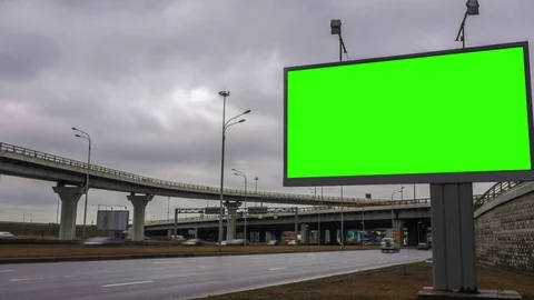 Billboard green screen near the transport interchange. time laps Stock Footage