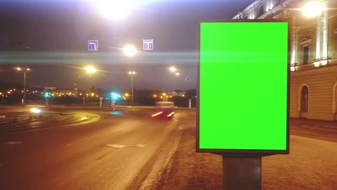 A Billboard with a Green Screen on a Streets .Time Lapse. 库存影片 71963976