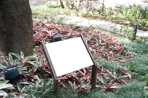 Billboard inside a garden Stock Photos