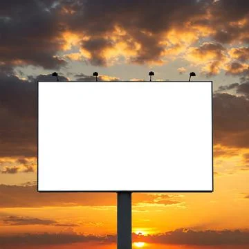 A billboard mockup in the sky at sunset Stock Photos