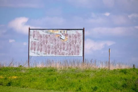 Billboard with old torn posters Foto stock