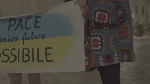 Billboard at a peace demonstration 스톡 동영상 179380287