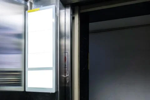 Billboard Rectangular White Mockup inside a Elevator City Advertisement Stock Photos