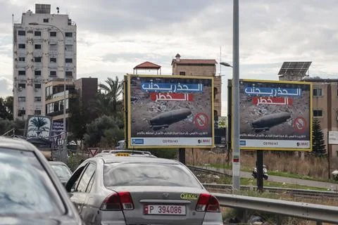 Billboard warning from unexploded bombs after Lebanon Israel ceasefire agreement Stock Photos