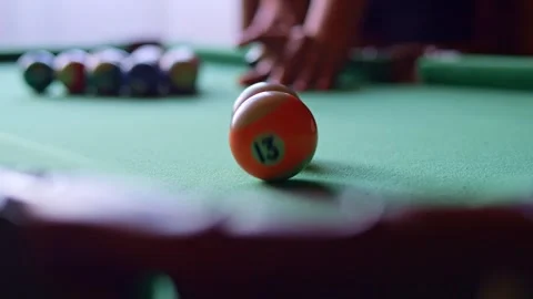 Billiard ball finds its mark after skillful strike in billiards Witness finesse Stock Footage 265220944