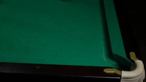 Billiard ball finds its mark after skillful strike in billiards Witness finesse Stock Footage 267404044