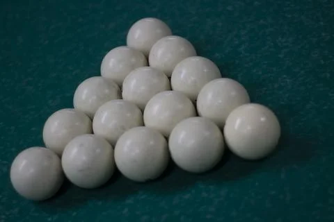 Billiard balls are collected in triangle. White balls on pool table. Details  Foto stock