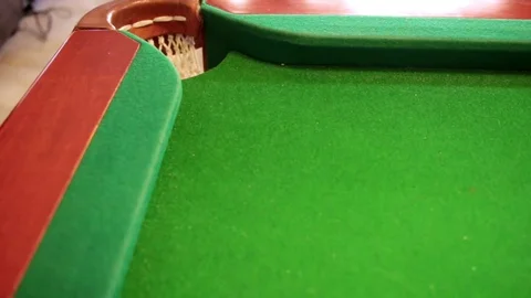 Billiard balls are pounded one by one Stock Footage 72634258