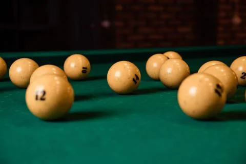Billiard balls on the billiard table Stock Photos