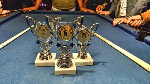 Billiard balls composition on green pool table Stock Photos